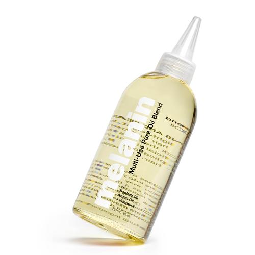 The Melanin Haircare Signature Collection includes styling product, the Multi-Use Pure Oil Blend